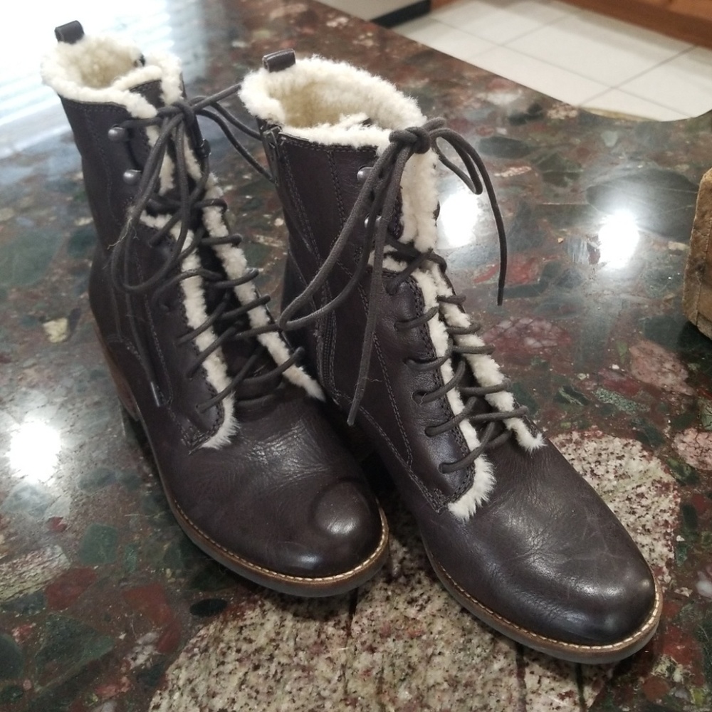 Beautiful brown with cream faux fur. Never worn!!